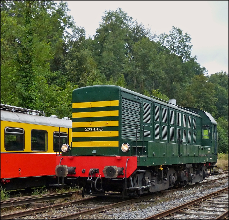 . HLD 270.005 (7005) is running through the station Dorinne-Durnal on the heritage railway track Le Chemin de Fer du Bocq on August 17th, 2013.