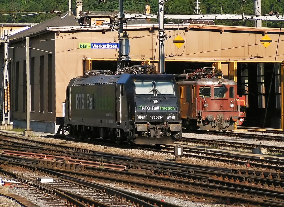 . RTS 185 569-1 and BLS Ae 8/8 pictured in Brig on August 6th, 2007.