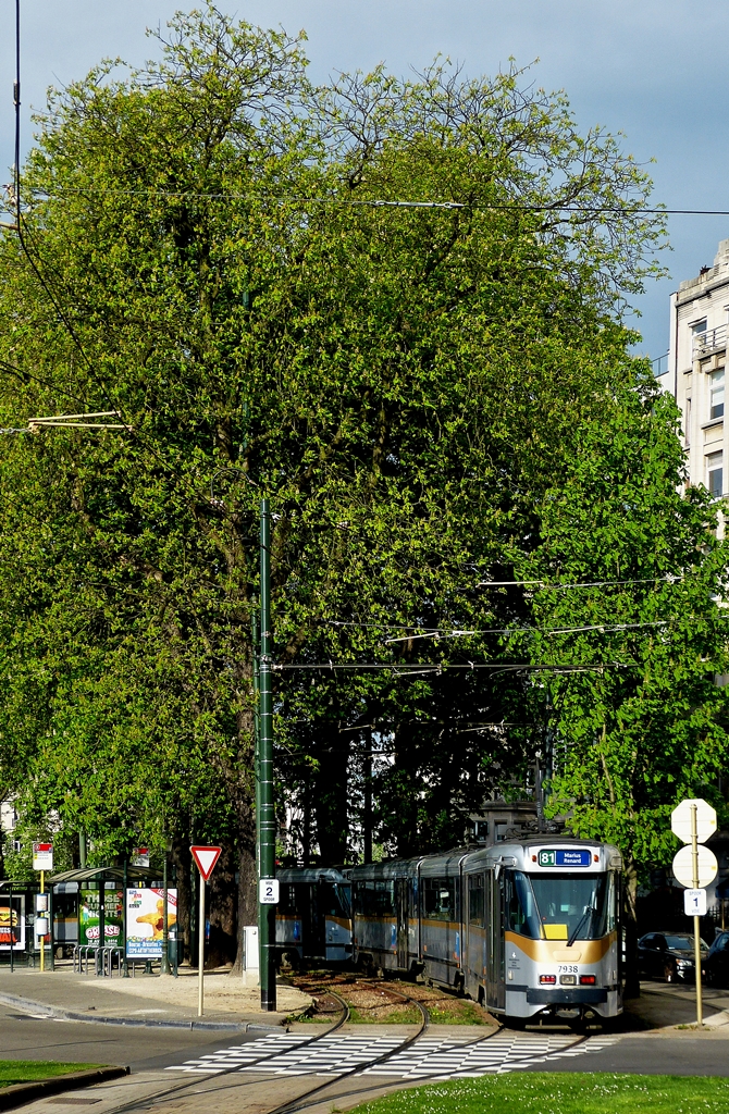 . Several trams photographed at the stop Montgomery in Brussels on April 6th, 2014.