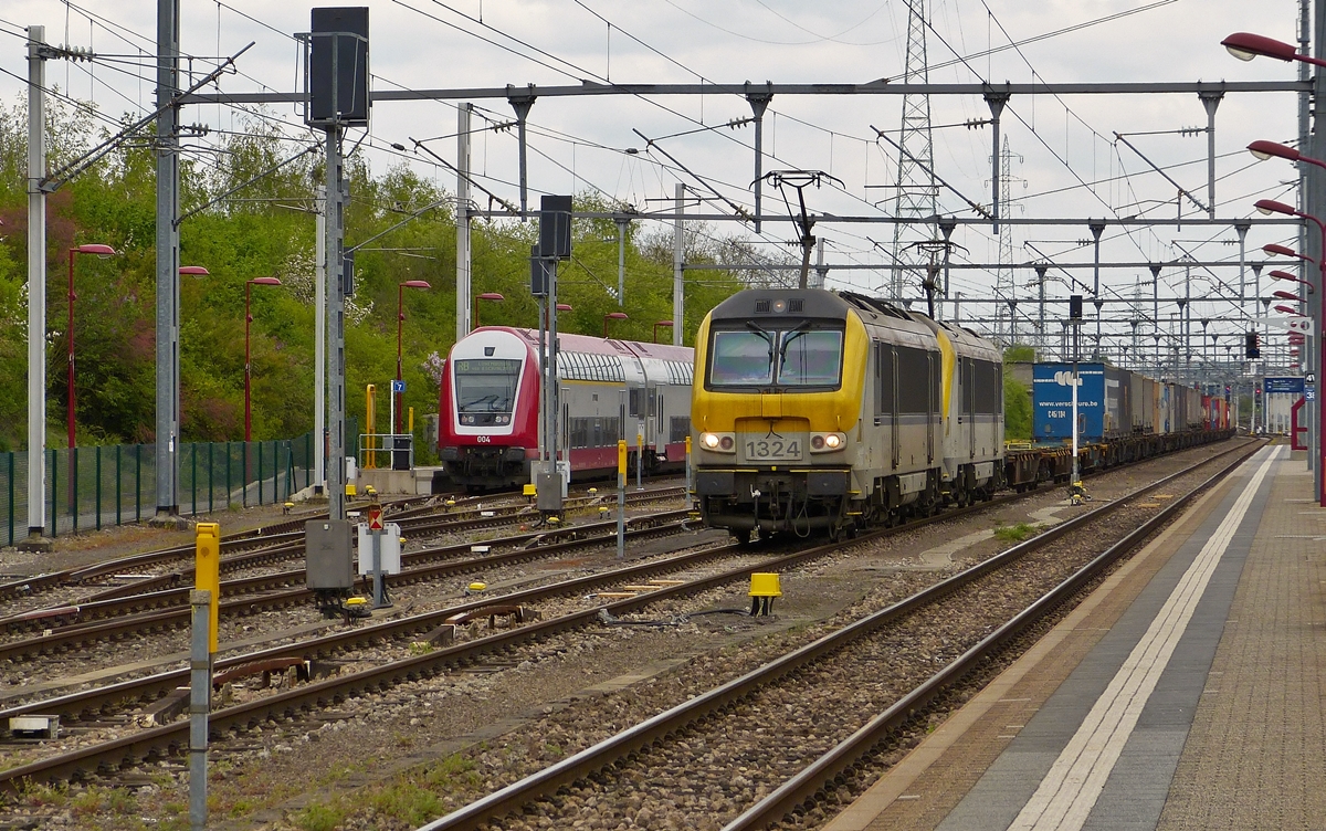 . SNCB Série 13 double header is hauling a goods train through the station of Rodange on April 29th, 2015.