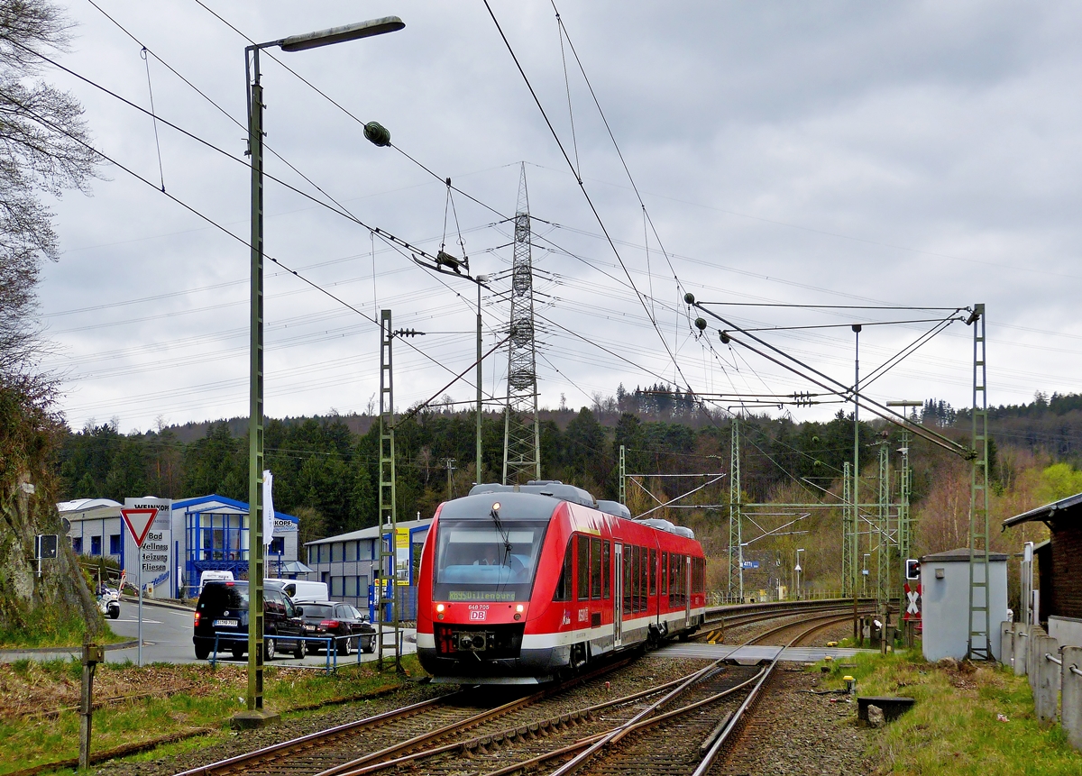 . The Alstom Coradia LINT 41 N 648 705 of the DreiLnderBahn is arriving as RB 95 Au/Sieg - Siegen - Dillenburg in Scheuerfeld/Sieg on March 22nd, 2014.