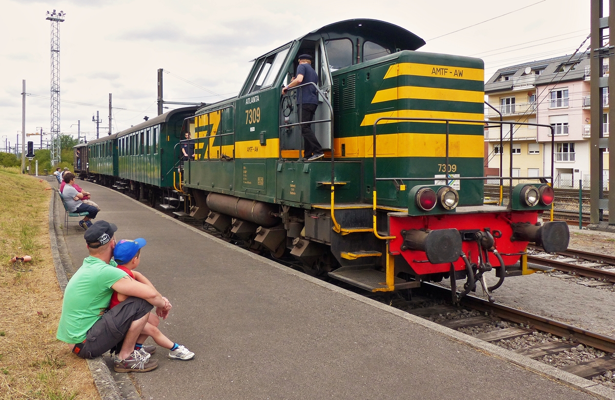 . The AMTF Diesel engine 7309  Atlanta  of the heritage railway  Train 1900  is arriving in Pétange on July 26th, 2015.