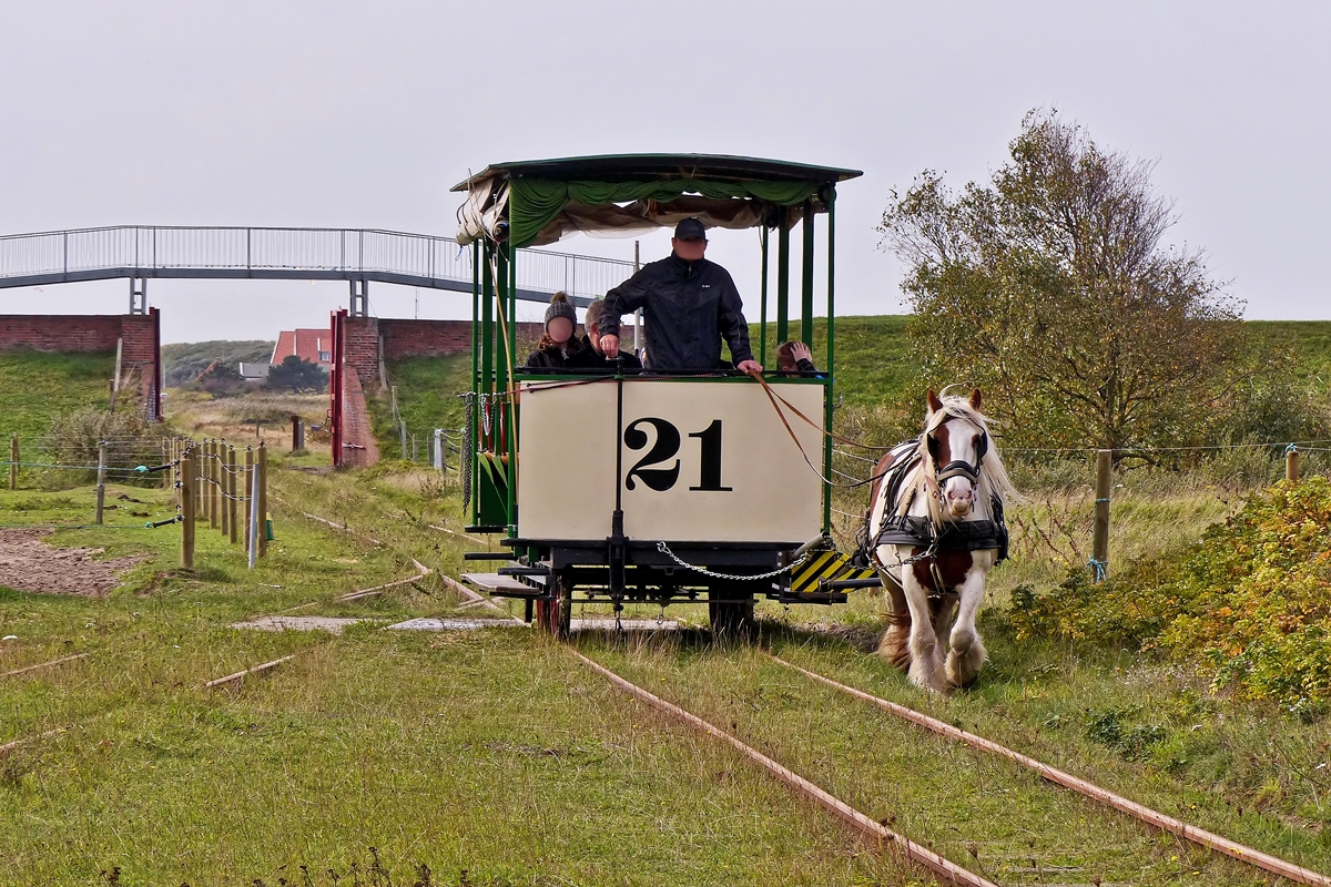 . The heritage waggon N° 21 is entering into the station of the Museumspferdebahn Spiekeroog on October 9th, 2014.