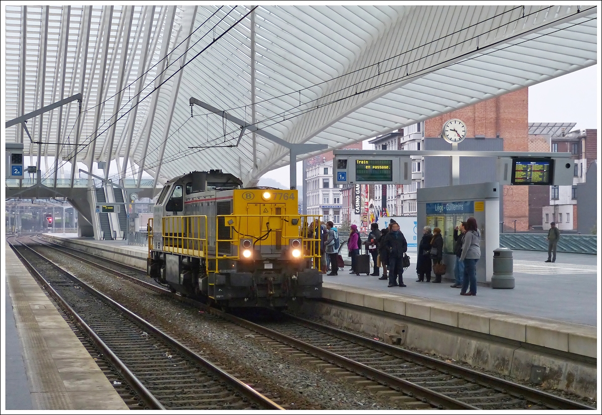 . The HLD 7764 is running through the station Liège Guillemins on November 23rd, 2013.