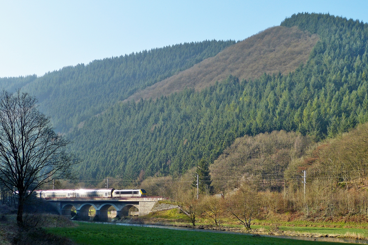 . The RB 3208 Luxembourg City - Wiltz is running on the Sre bridge in Michelau on March 10th, 2014