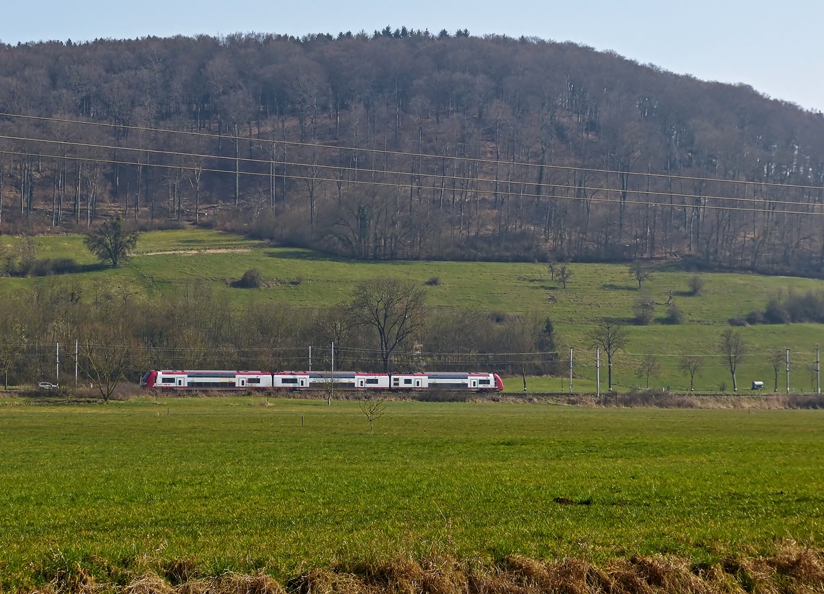 . The RB 3438 Ettelbrck - Luxembourg City photographed between Lorentzweiler and Lintgen on March 14th, 2014.