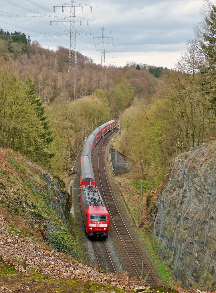 . The RE 9 Aachen - Siegen (Rhein-Sieg-Express) is headed by 120 206-8 in Scheuerfeld/Sieg on March 22nd, 2014.