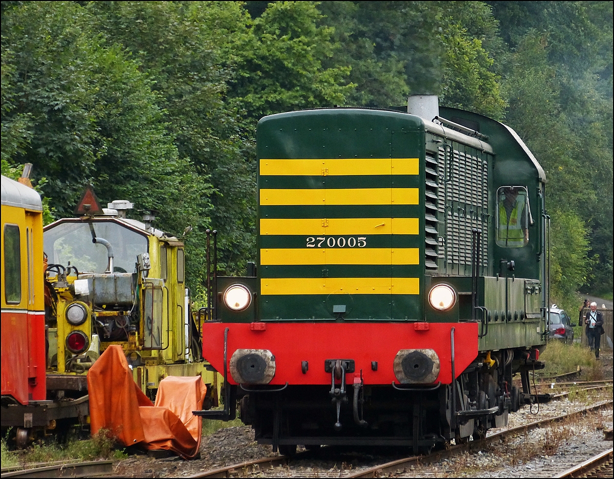 . The shunter engine HLR 270.005 (7005) is running through the station Dorinne-Durnal on the heritage railway track Le Chemin de Fer du Bocq on August 17th, 2013.