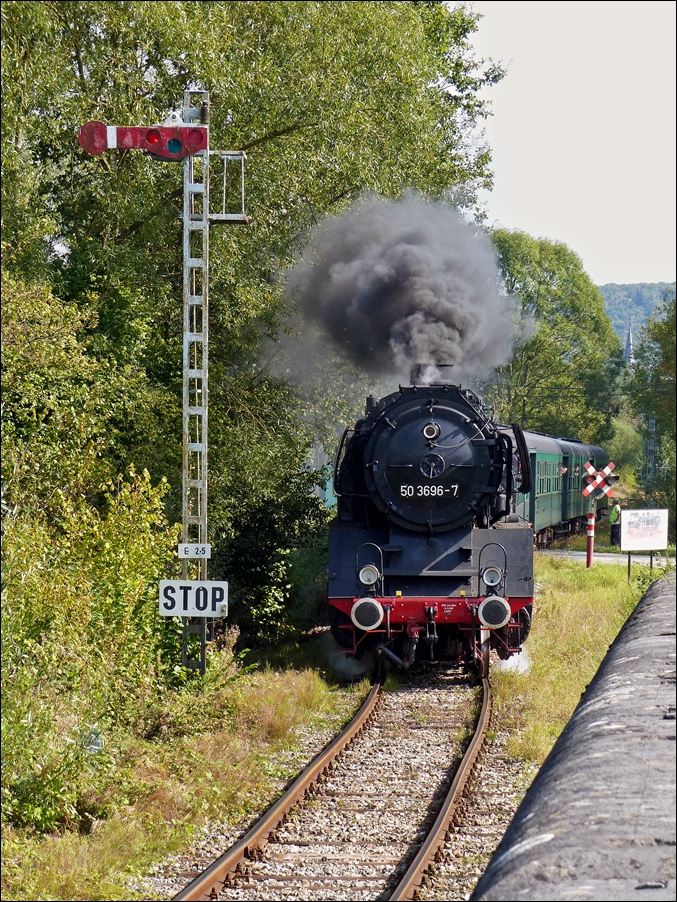 . The steam engine 50 3696-7 of the heritage railway CFV3V (Chemin de Fer  Vapeur des 3 Valles) photographed in Olloy-sur-Viroin on September 28th, 2014.