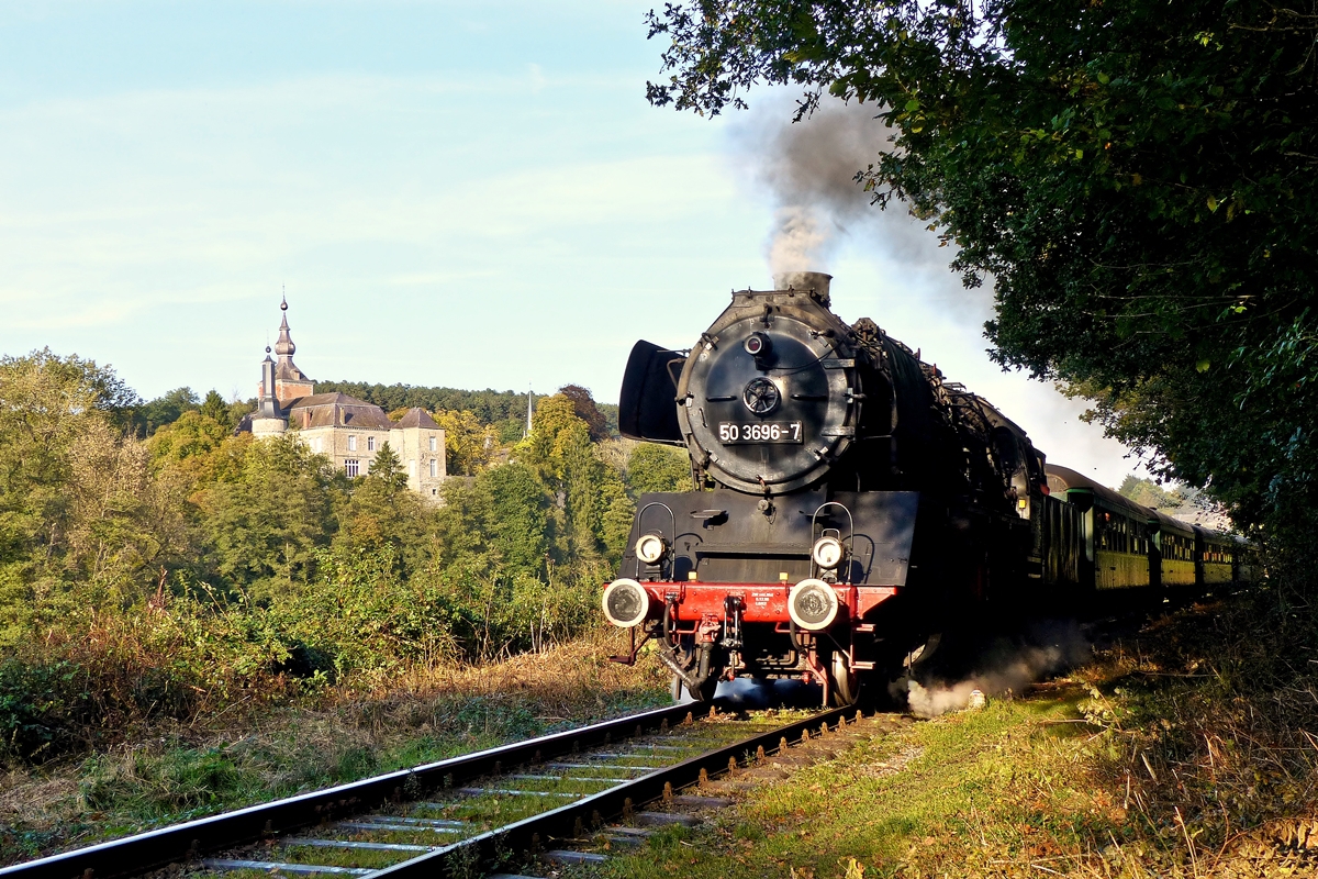 . The steam engine 50 3696-7 is heading a heritage train on the track of the heritage railway CFV3V (Chemin de Fer à Vapeur des 3 Vallées) in Vierves-sur-Viroin on September 28th, 2014.