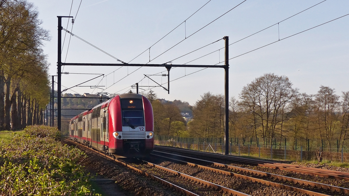 . Z 2212 is running as RB 3508 Luxembourg City - Diekrich between Colmar-Berg and Schieren on April 21st, 2015.