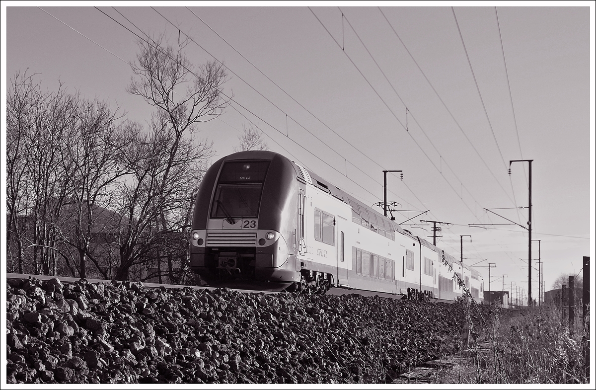 . Z 2223 as RB 3214 Luxembourg City - Wiltz is running between Lintgen and Mersch on December 15th, 2013.