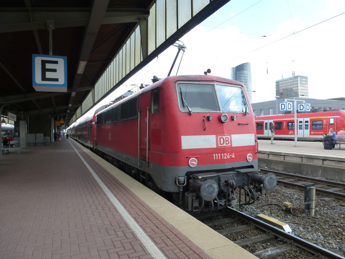 111 124-4 is standing in Dortmund main station on August 19th 2013.