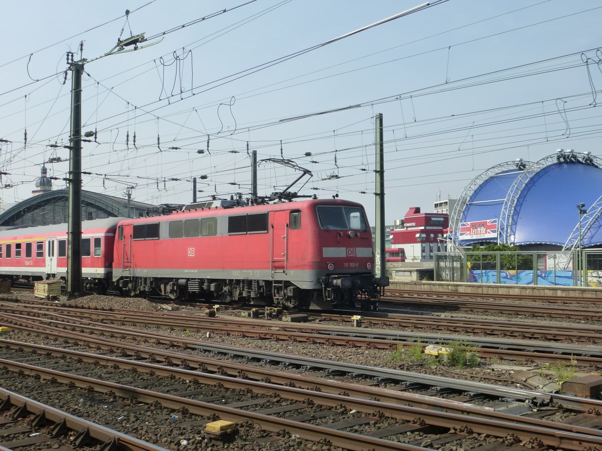 111 160 is driving between the main station and the Hohenzollernbridge in Cologne on August 22nd 2013.