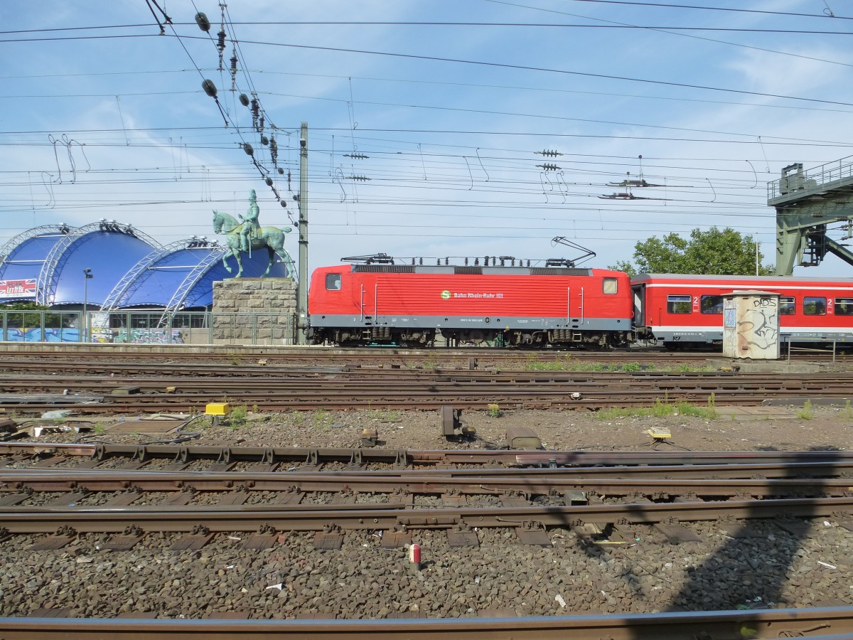 143 606-2 is driving between the main station and the Hohenzollernbridge on August 21st 2013.