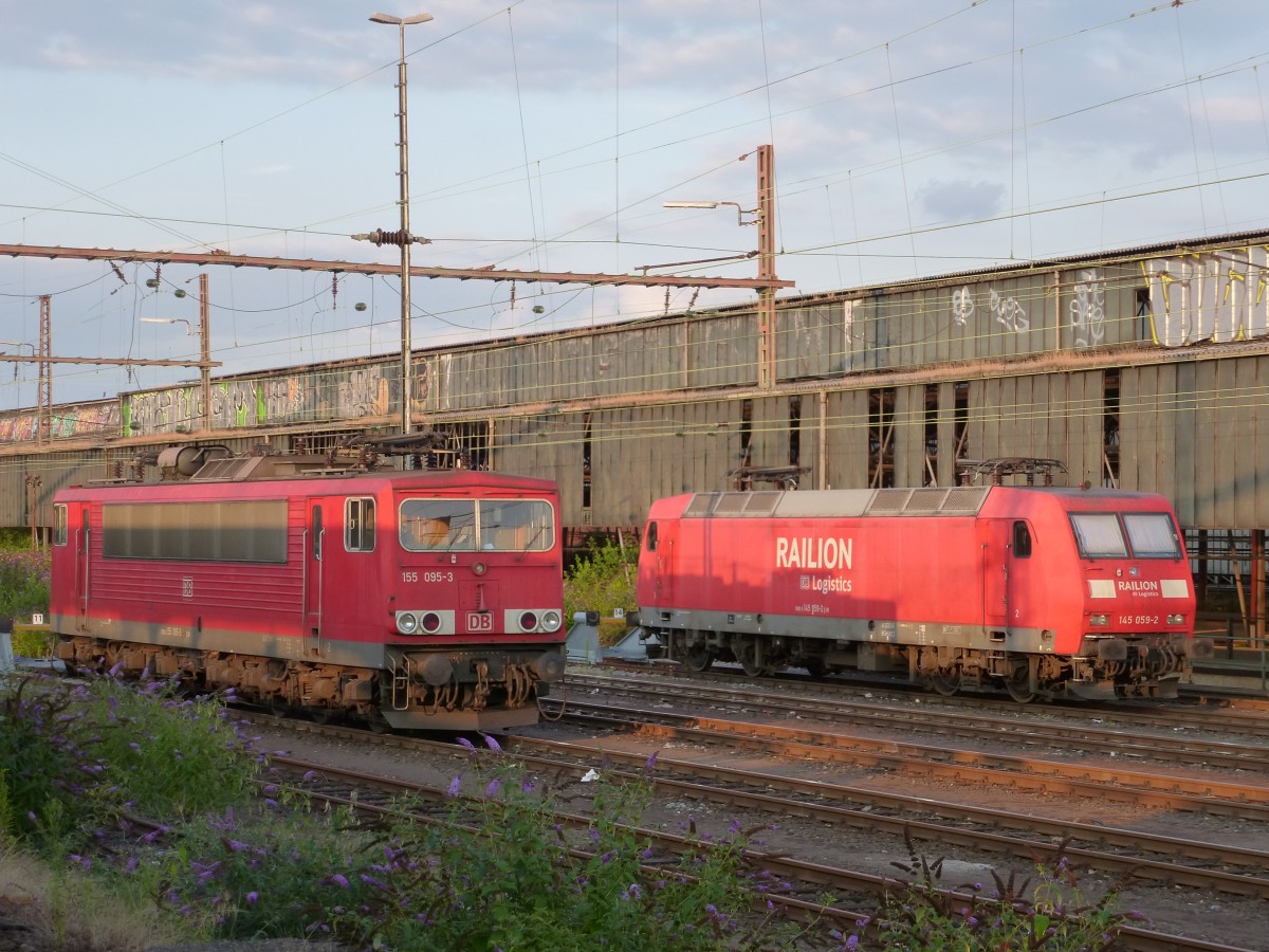 155 095-3 and 145 059-2 are standing in Wanne-Eickel main station on August 20th 2013.