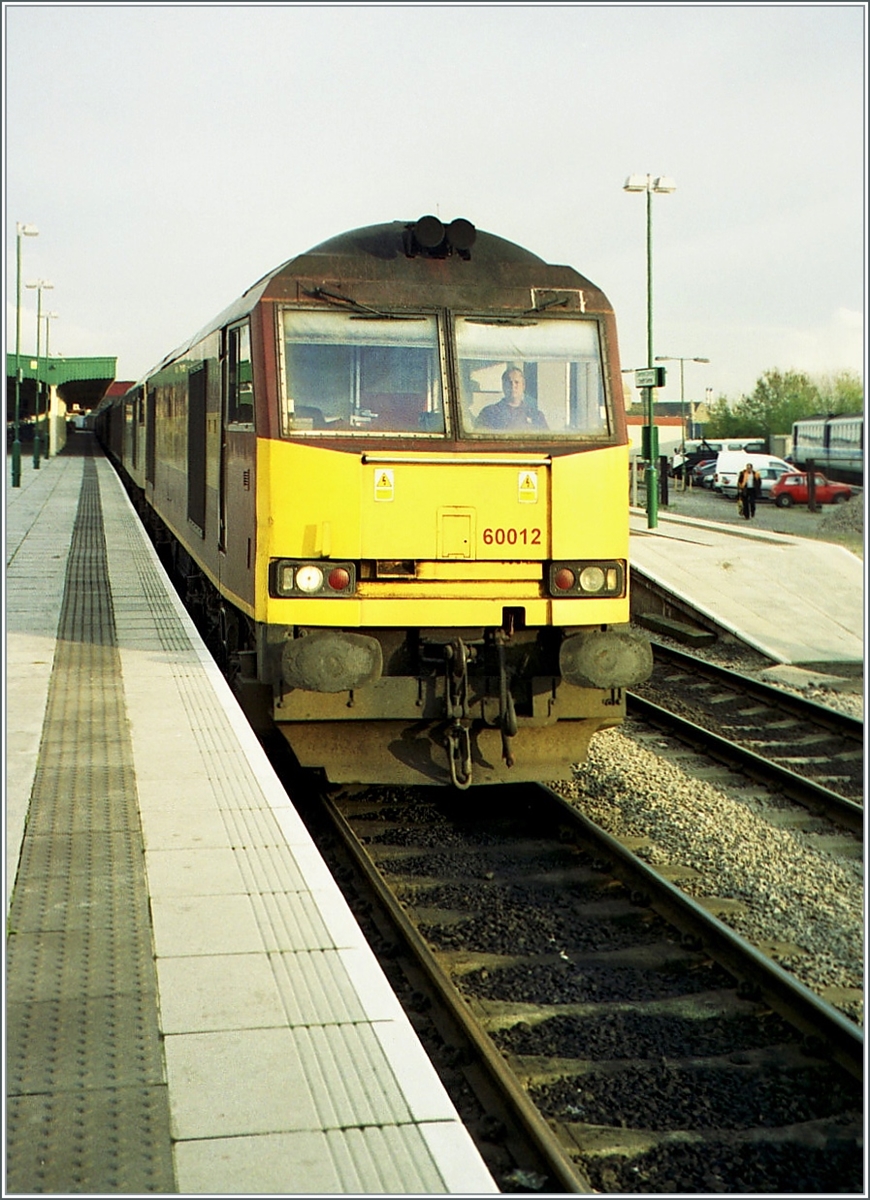 A Class 60, the EWS 60012 in Cardiff Central. 

Analog picture / November 2000