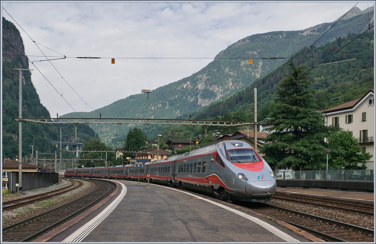 A FS Trenitalia ETR 610 on the way to Milano in Faido without stop in this station. 

21.07.2016
