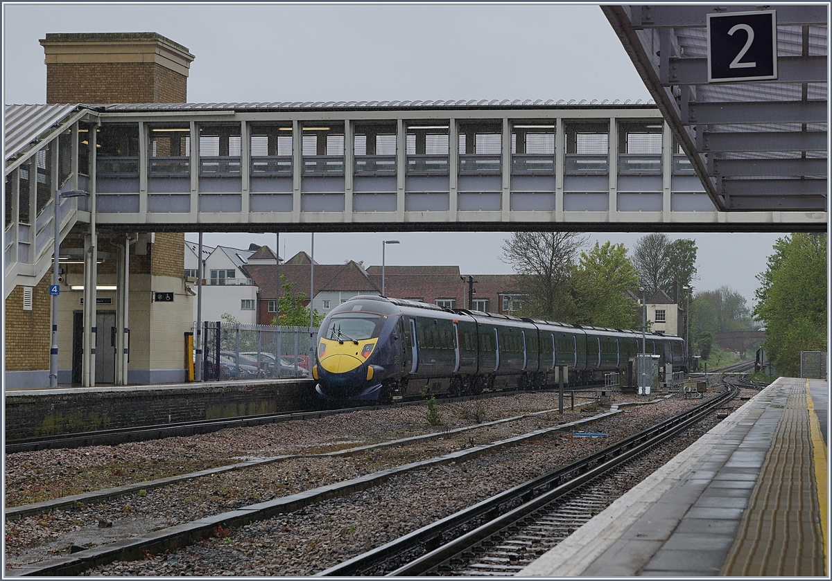 A High Speed Class 395 is leaving Canterbury West on the way to London.
