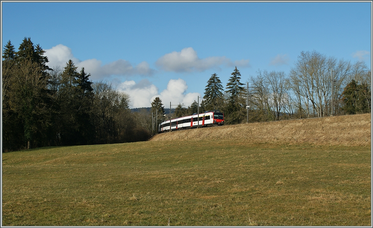 A local train from Payern to Lausanne by Palezieux-Village.
