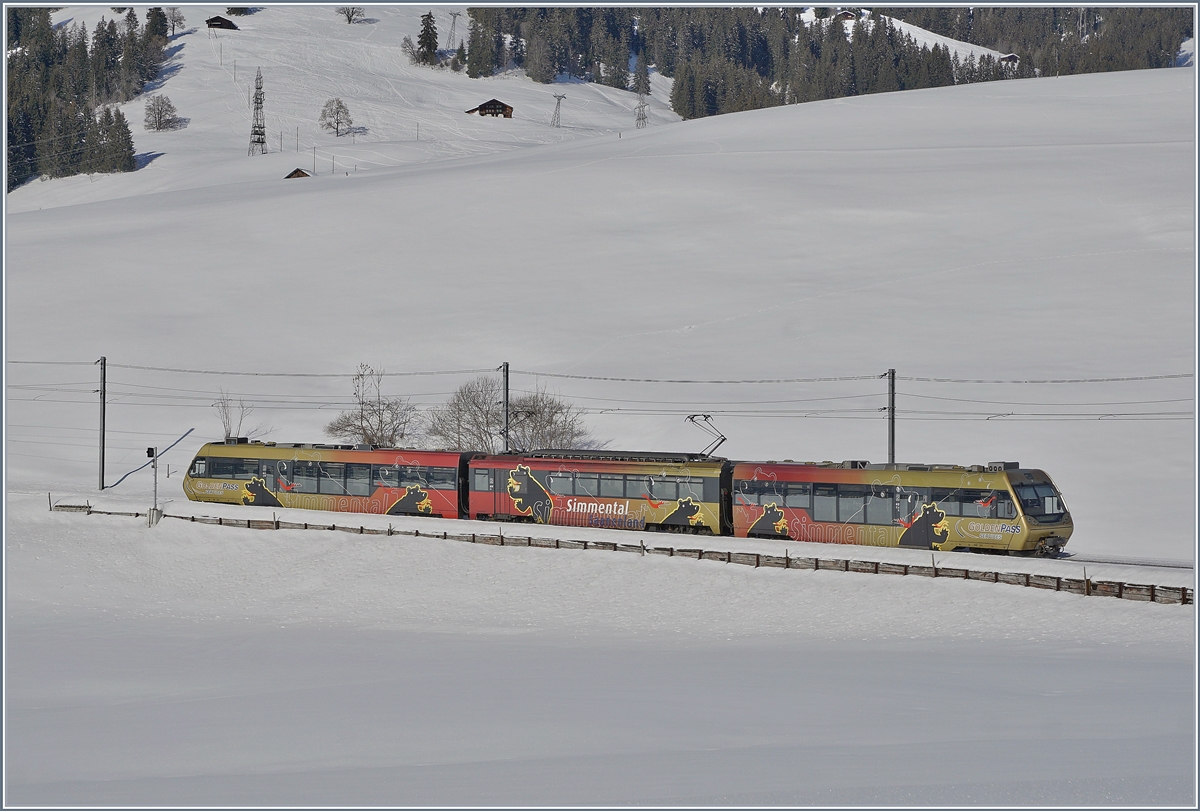 A MOB Be 4/4 wiht Bt and ABt on the way to Zweisimmen betwenn Gruben and Schönried. 

06.02.2019