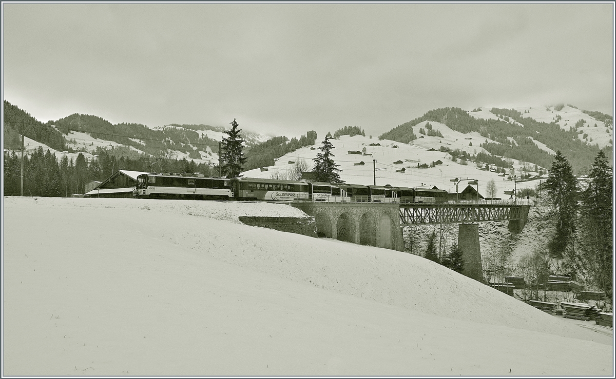 A MOB GDe 4/4 (Serie 6000) wiht a Panoramic Express by Flendruz. 

03.12.2020