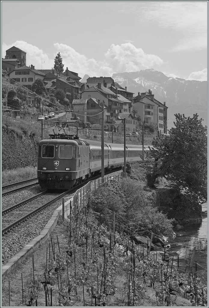 A Re 4/4 II with an IR by st Saphorin. 28.05.2013