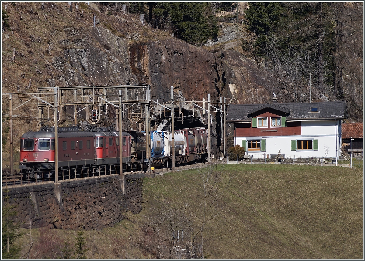 A Re 6/6 and a Re 4/4 wiht a Cargo Train near Wassen.
14.03.2014