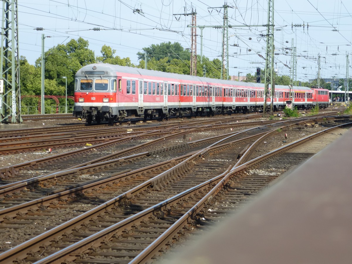 A RE to Cologne is driving between Kln-Messe Deutz and the Hohenzollernbridge in Cologne on August 21st 2013.