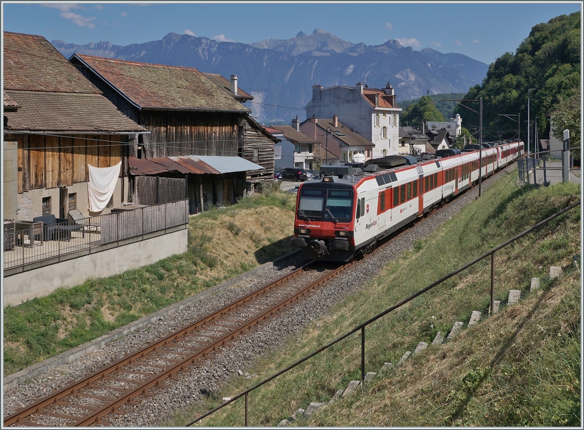 A Region Alps RBDe 560 Domino from Brig is shortly arriving at St Gingolph (Suisse) Station. 

16.08.2022