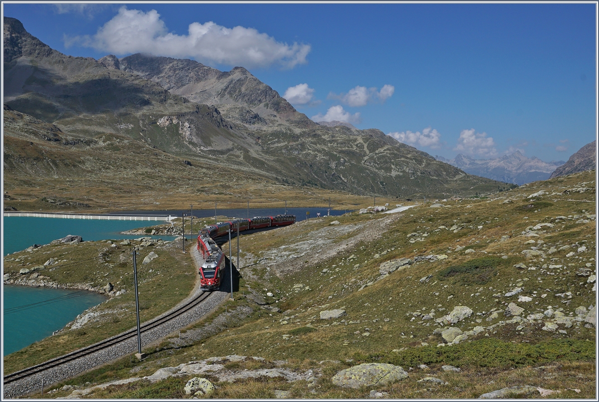 A RhB  Allegra  with a Bernina Express on the way to Tirano near the Bernina Ospizio Station. 

13.09.2013