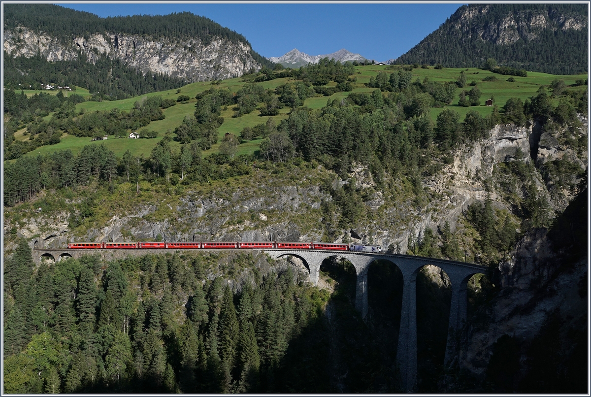 A RhB Fast-Train Service from Chur to St Moritz by the Landwasser Bridge near Filisur. 12.09.2016