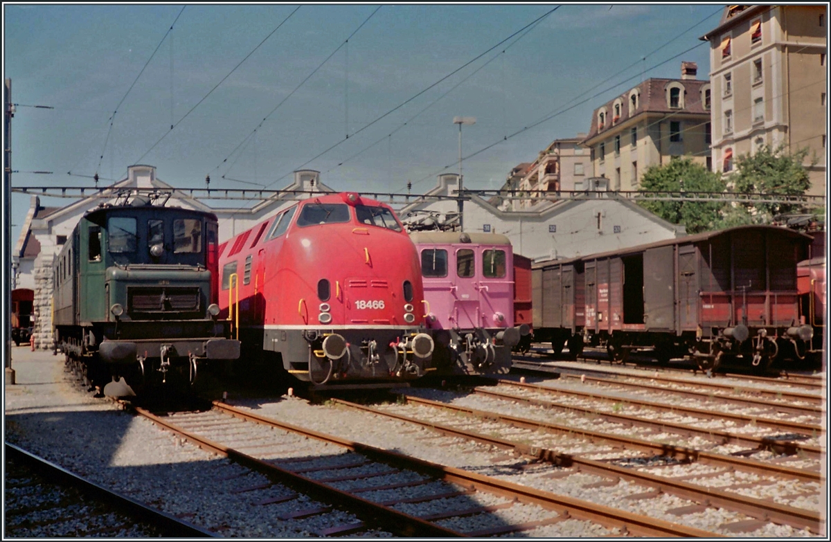 A SBB Ae 4/7, the SBB CFF FFS Am 4/4 18467 and a Be 4/6 in Lausanne. 

analog picture 

17. 03.1993 