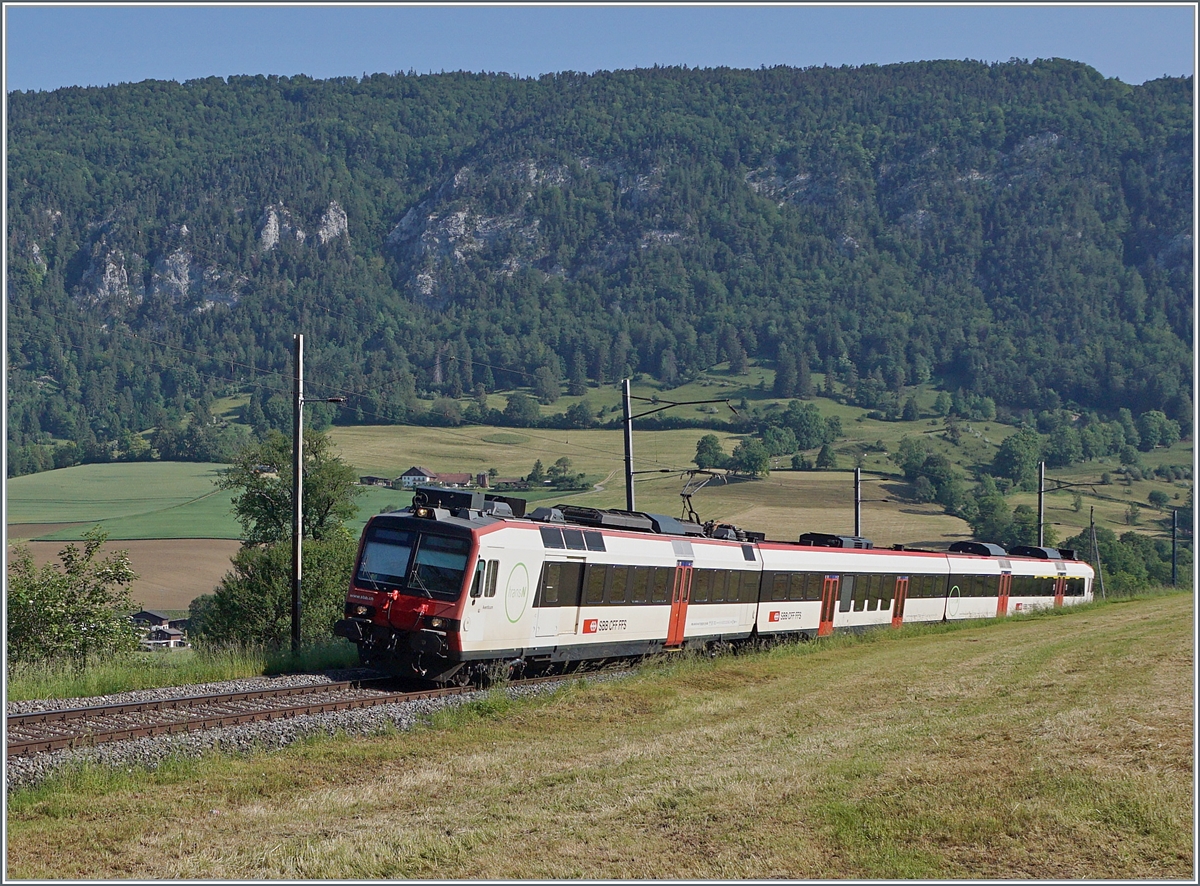 A SBB Domino runs on the Solothurn - Moutier Line (ex SMB now BLS) bei Corcelles BE on the way to Solothurn. 

05.06.2023