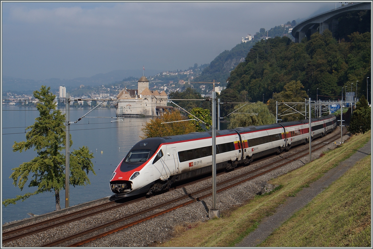 A SBB ETR 610 from Milano to Geneva by the Castle of Chillon.  
02.10.2015