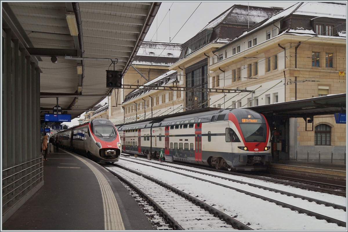 A SBB ETR 610 (Pinocchio) from Lausanne to Brig and the SBB RABe 511 019 from Annemasse to St-Maurice in Lausanne. 

17.01.2021 