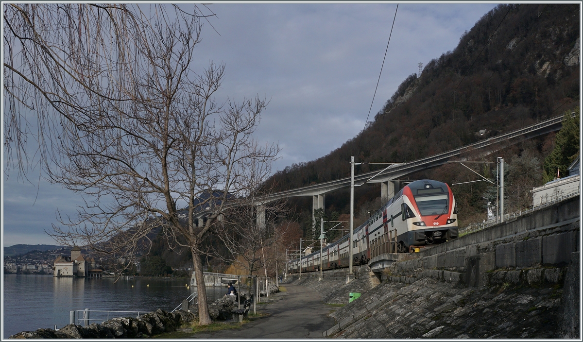 A SBB Kiss RABe 511 119 on the way to Annemasse by Villeneuve. In the background the Castle of Chillon.

03.01.2022