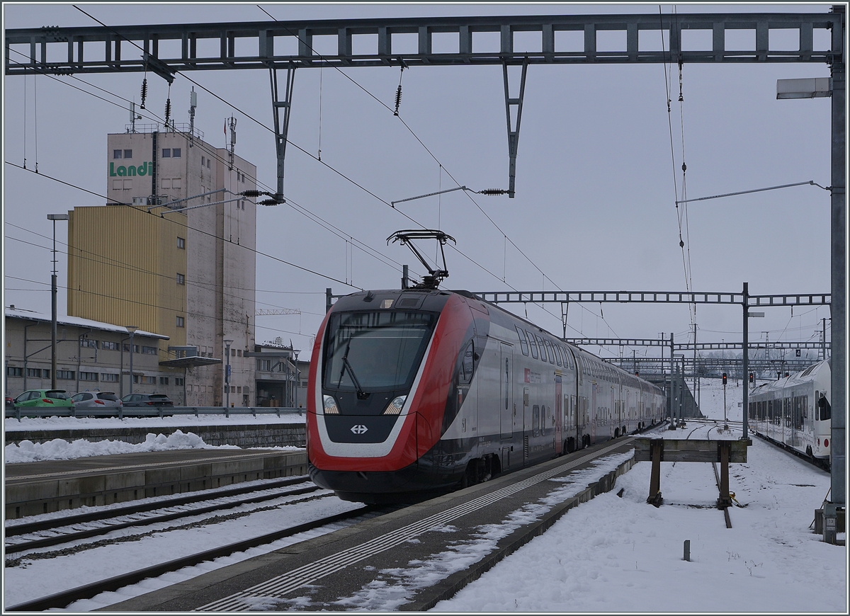 A SBB RABe 502  Twidexx  on the way to St Gallen in Romont. 

22.12.2021