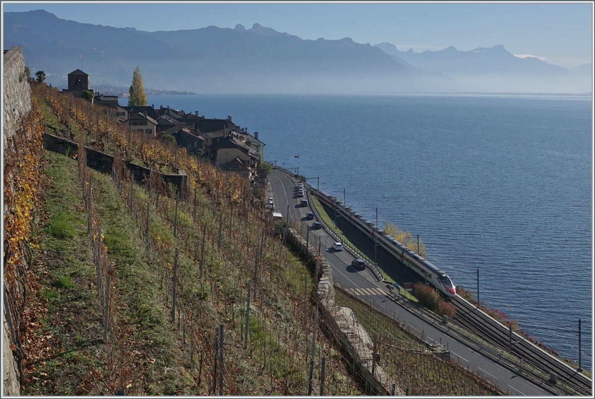 A SBB RABe 503 / ETR 610 is the EC 32 from Milano to Genève near St-Saphorin.

03.11.2020