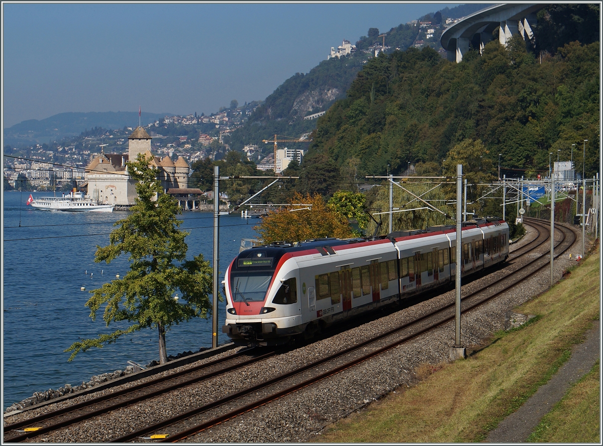A SBB RABE 523 Flirt on the way to Lausanne by the Castle of Chillon.
01.10.2015