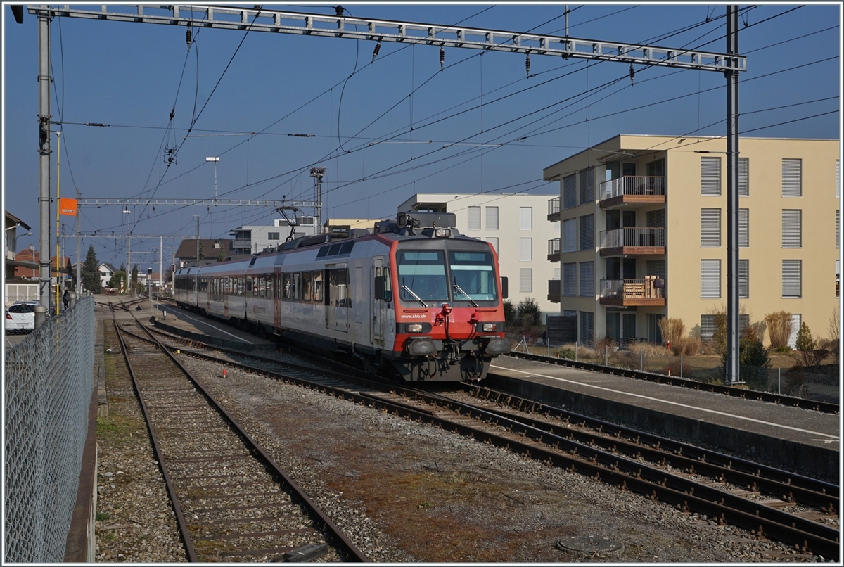 A SBB RBDe 560 is the TPF local train service from Ins to Fribourg by his stop in Sugiez, one of the last  old  stations by the TPF.

09.03.2022