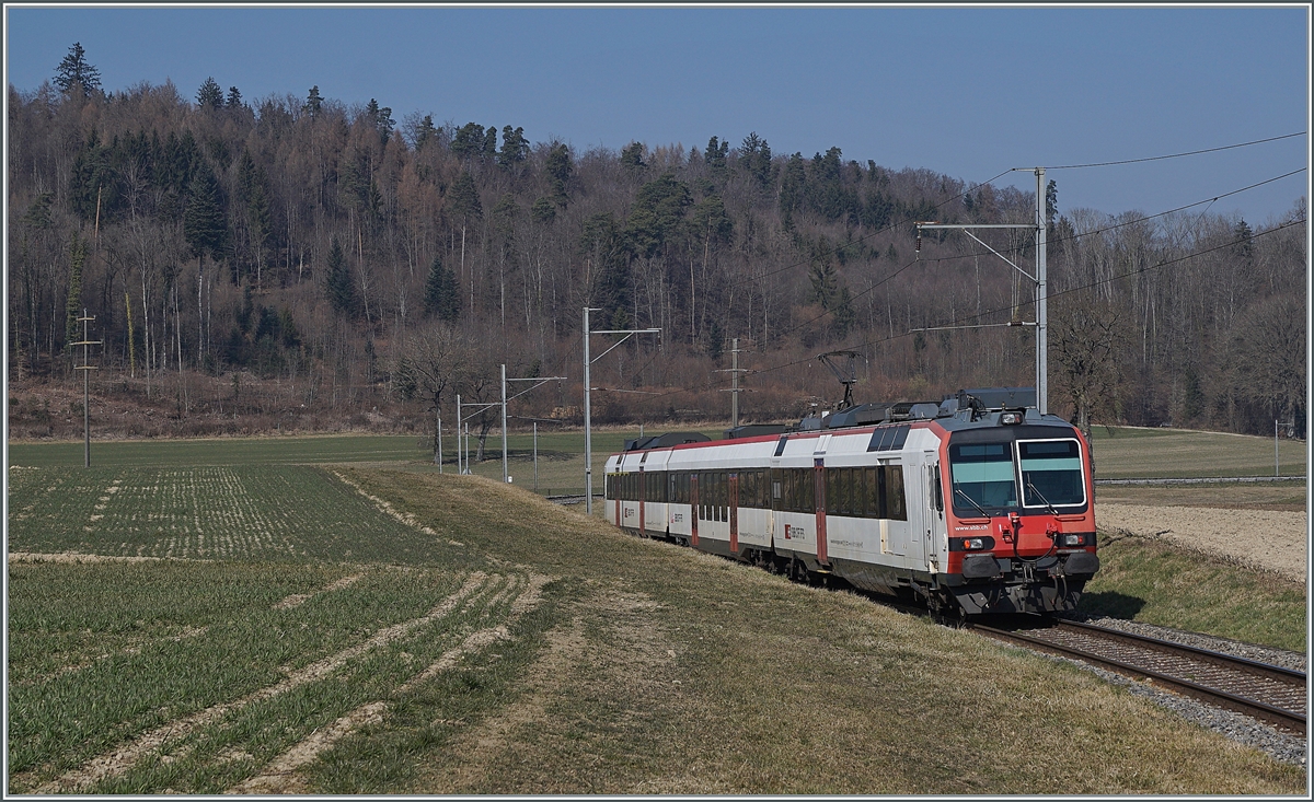 A SBB RBDe 560 on the way to Ins by Courtepin on the TPF Linie.

09.03.2022