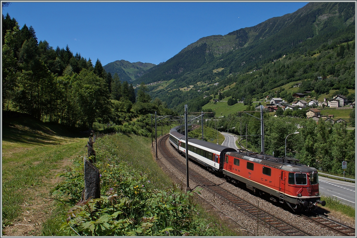 A SBB Re 4/4 II wiht his IR to Locarno near Rodi Fiesso. 
24.06.2015