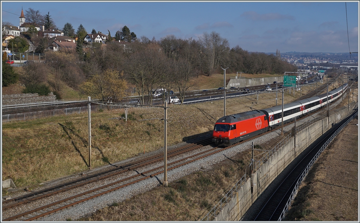 A SBB Re 460 with an IR 90 on the way form Brig to Geneva Airport by Denges Echandens. 

04.02.2022