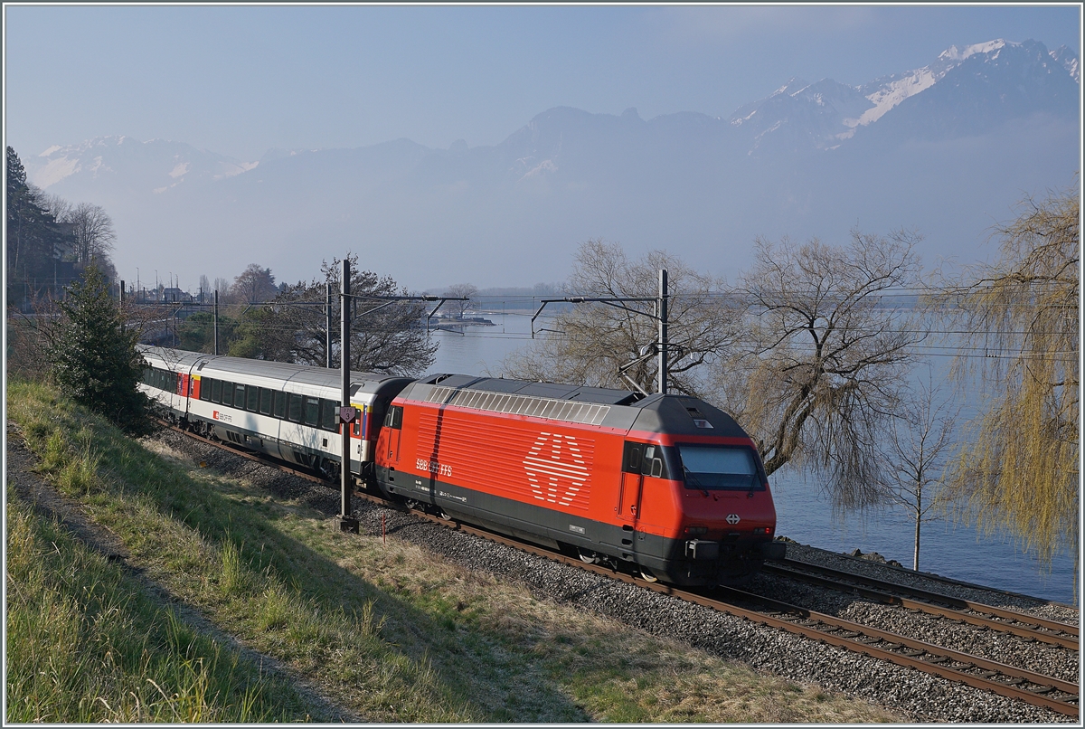 A SBB Re 460 with his IR 90 from Geneva to Brig near the Castle of Chillon. 

08.03.2022