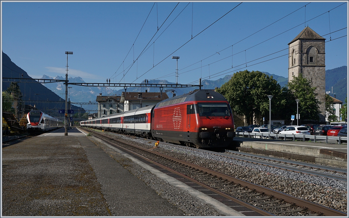 A SBB Re 460 with his IR from Brig to Geneva Airport in Villeneuve. 

01.07.2019