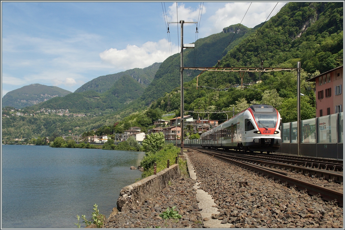 A TILO RABe 524 by Capolago Riva San Vitale on the way to Chiasso. 

05.05.2014 