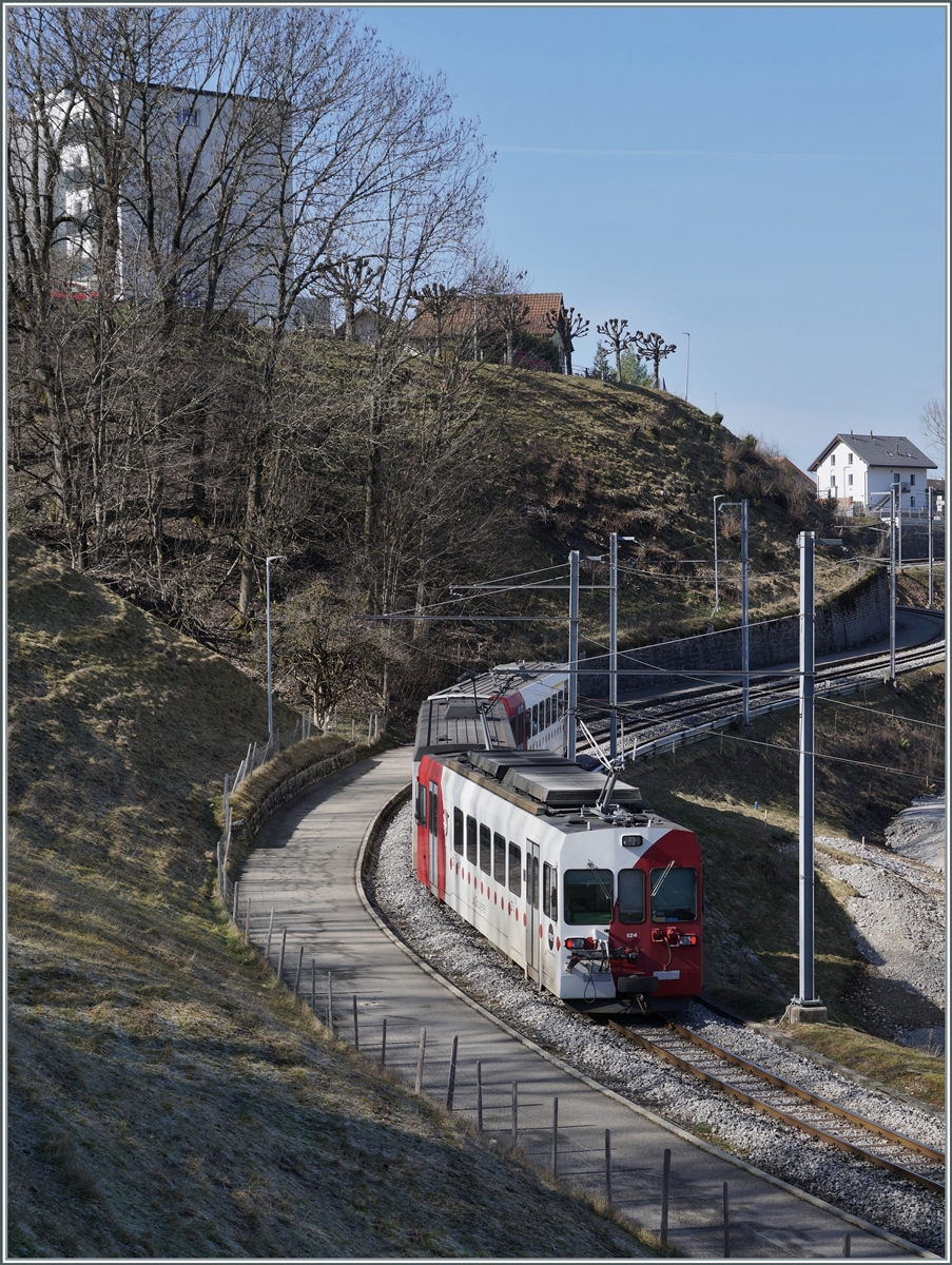 A TPF Be 4/4 with Bt on the way from Broc Fabrique to Bulle between Broc Fabrique and Broc Village. 

03.02.2021