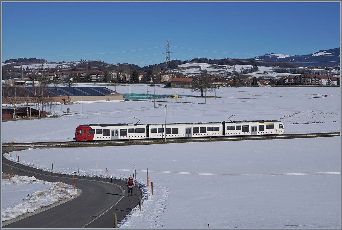 A TPF local train on the way to Montbovon near Bossennes. 
16.02.2019