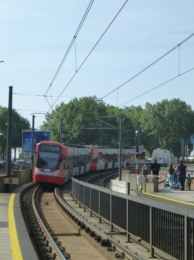 A tram (line 9) is arrriving in  Deutzer Freiheit  in Cologne on August 21st 2013.